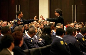 Dr John Demartini embraces Police Officer in Cape Town