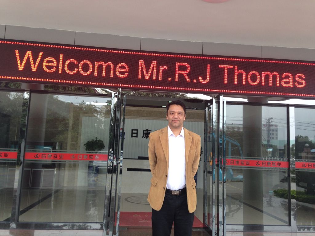 Ramon Thomas outisde Chinese company in DongGuan, Guangdong China